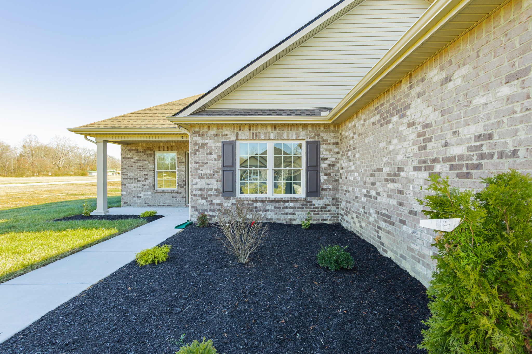 31 Brooklyn Avenue Manchester, TN 37355 - Photo 14 of 66 a front view of a house with garden