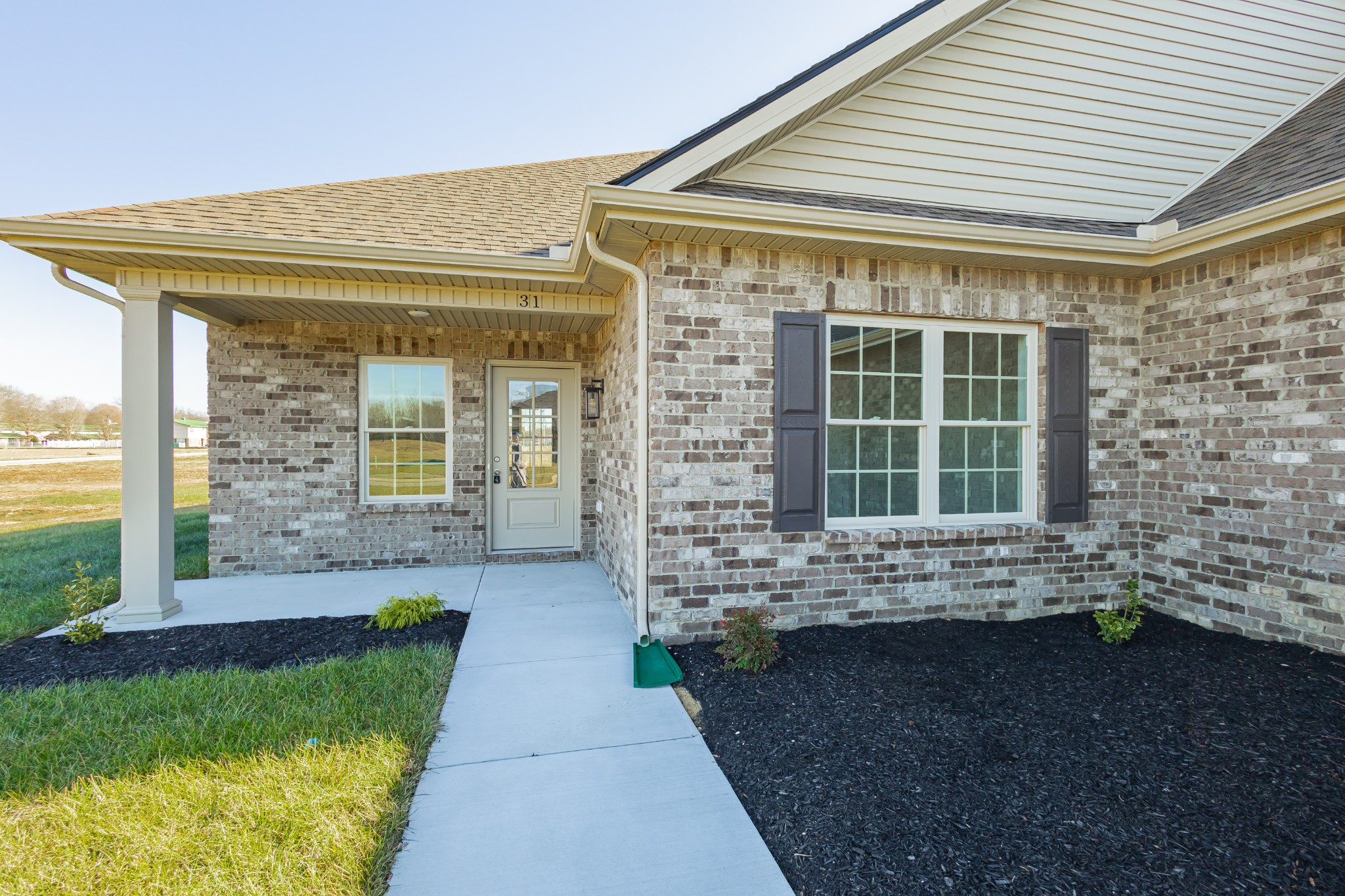 31 Brooklyn Avenue Manchester, TN 37355 - Photo 15 of 66 a front view of a house with a yard