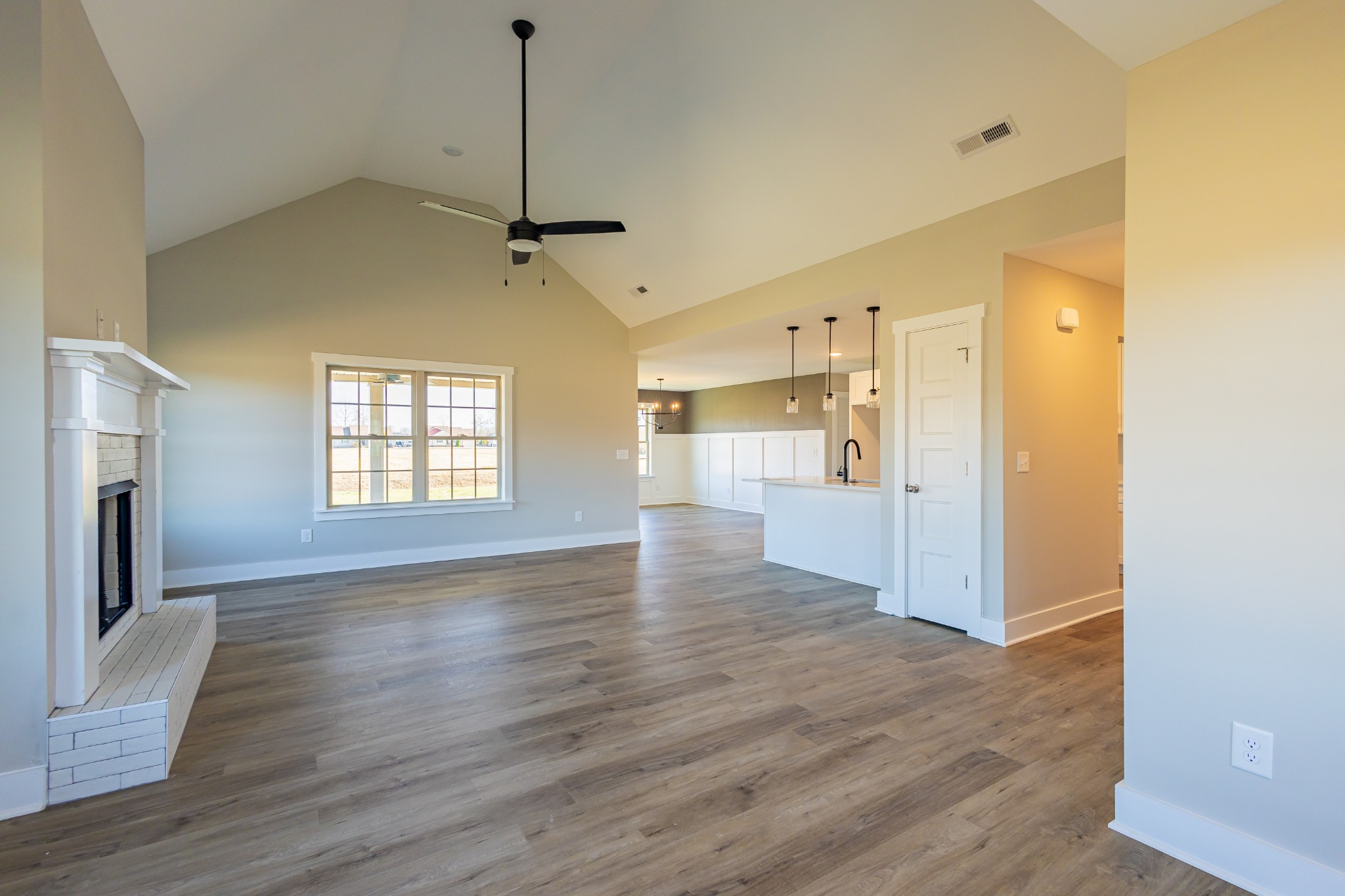 31 Brooklyn Avenue Manchester, TN 37355 - Photo 22 of 66 a view of an empty room with window and wooden floor