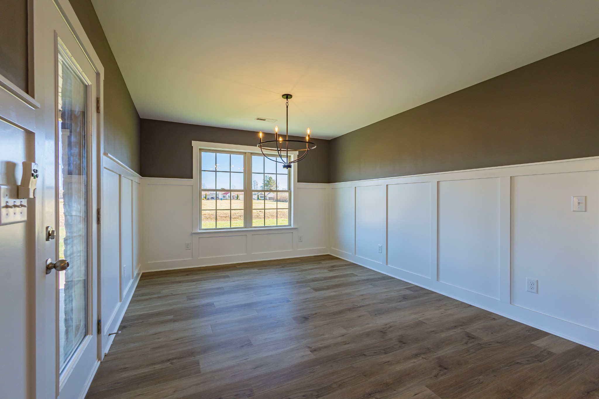 31 Brooklyn Avenue Manchester, TN 37355 - Photo 32 of 66 a view of an empty room with wooden floor and a window