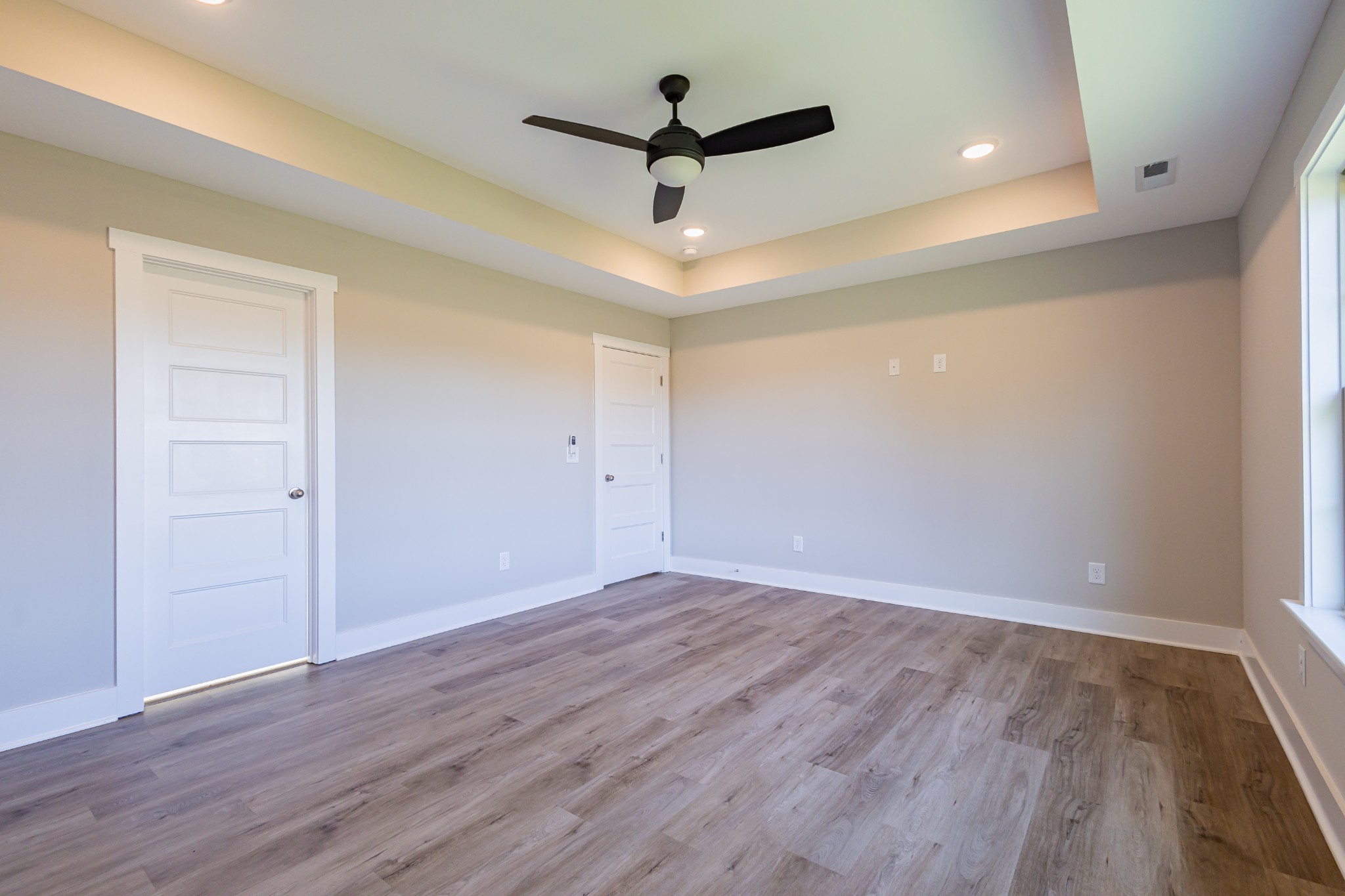 31 Brooklyn Avenue Manchester, TN 37355 - Photo 38 of 66 wooden floor in an empty room with a window