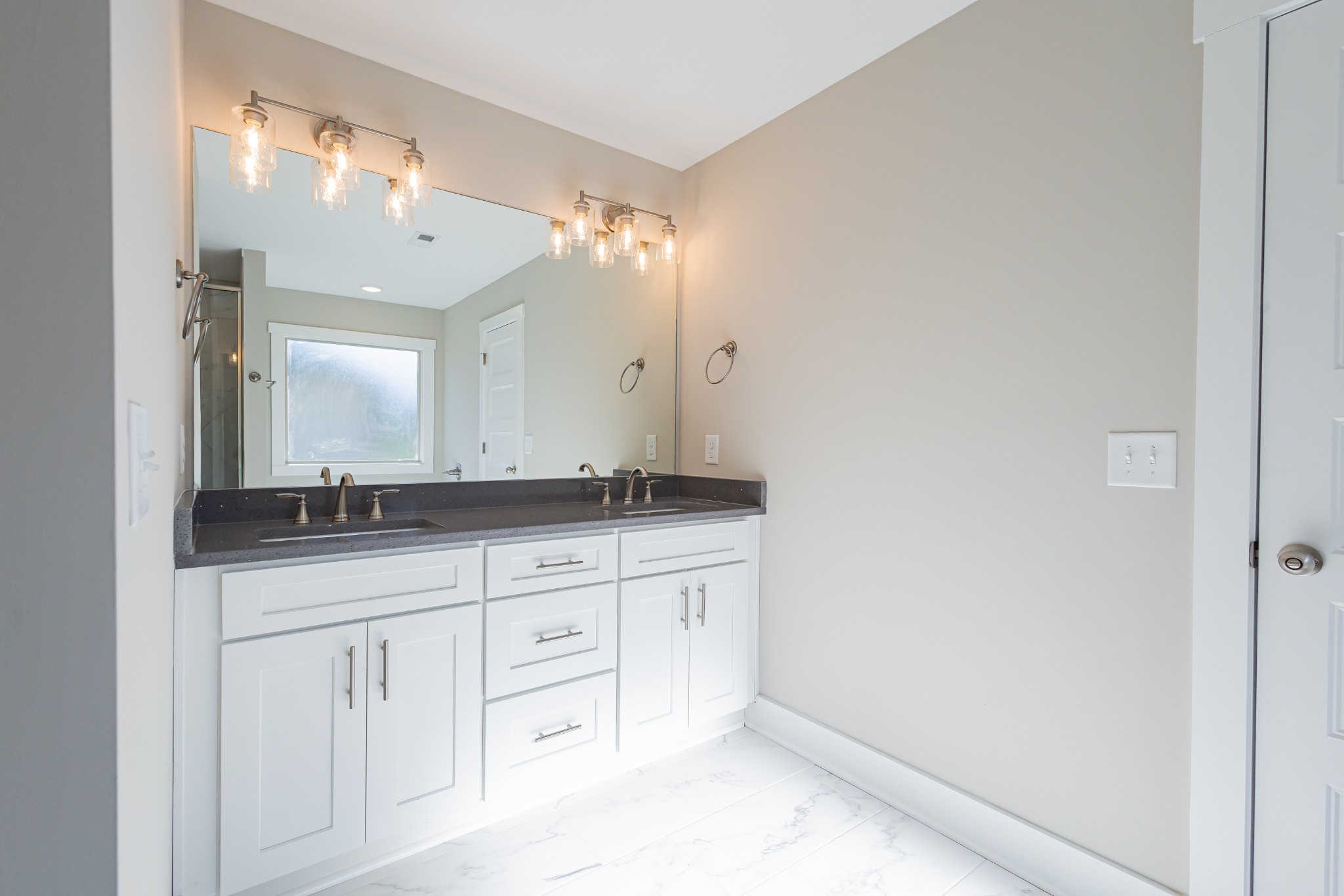 31 Brooklyn Avenue Manchester, TN 37355 - Photo 39 of 66 a bathroom with a sink and a mirror