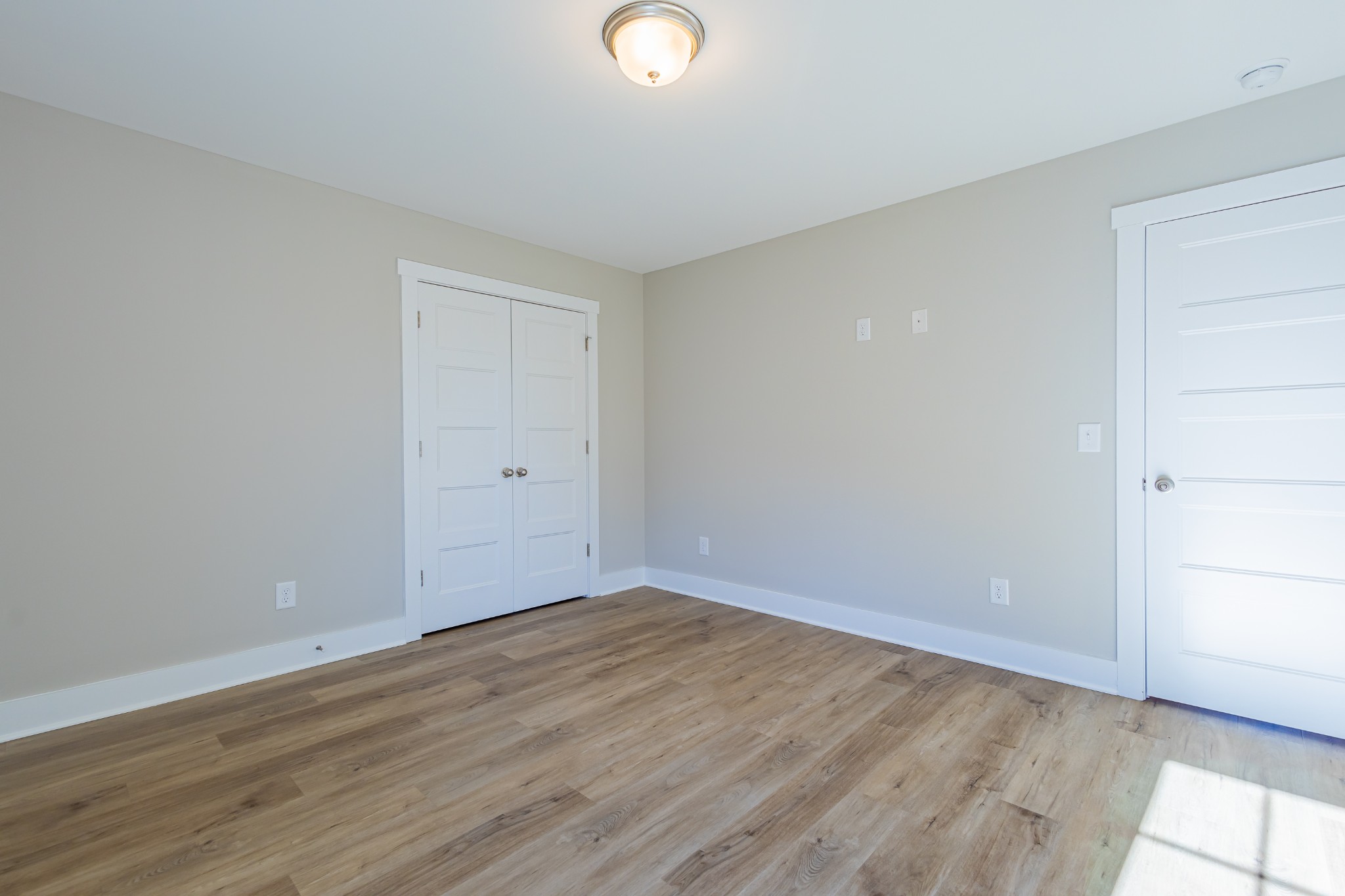 31 Brooklyn Avenue Manchester, TN 37355 - Photo 53 of 66 a view of an empty room with wooden floor and windows