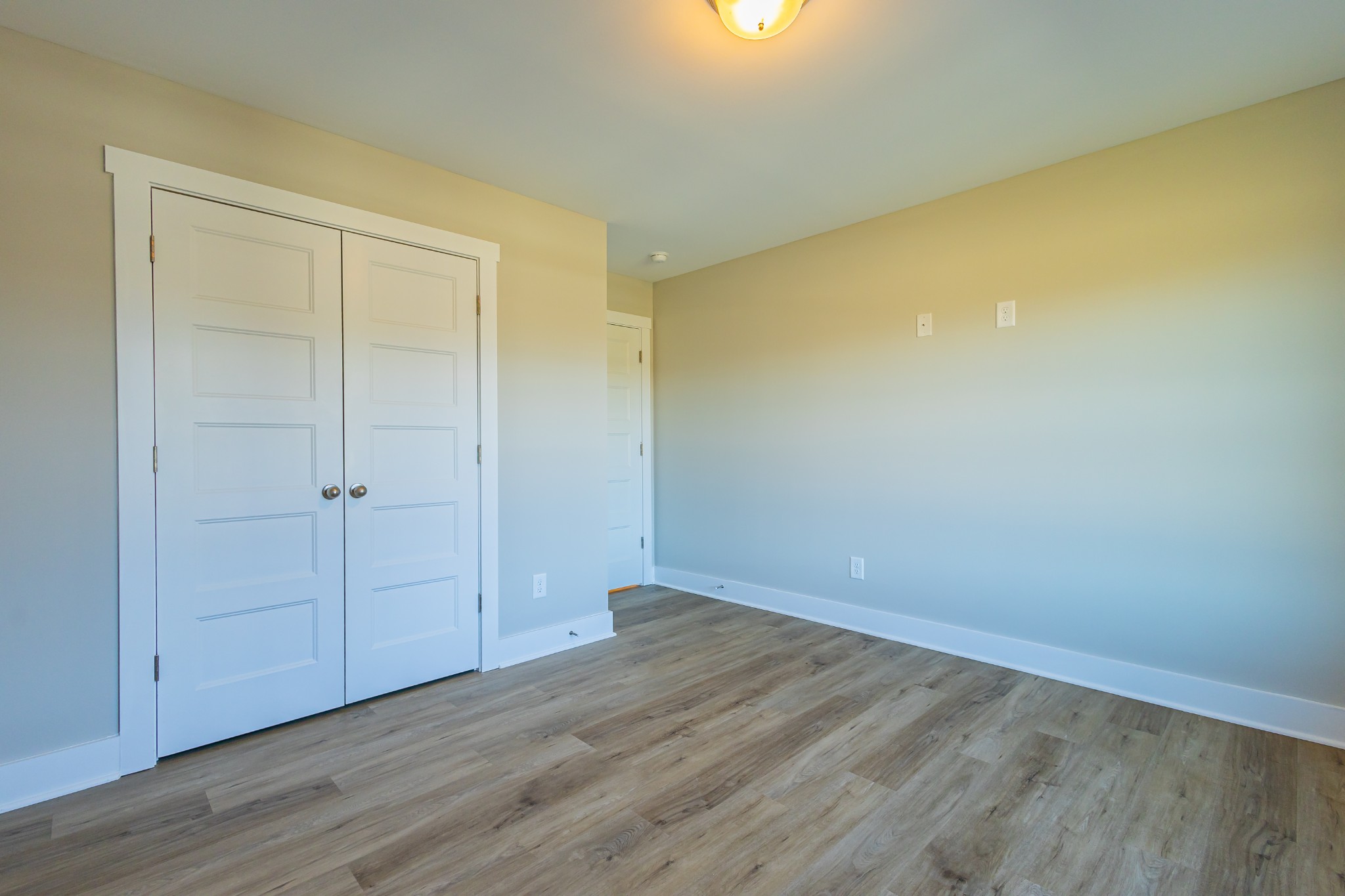 31 Brooklyn Avenue Manchester, TN 37355 - Photo 54 of 66 a view of an empty room with wooden floor
