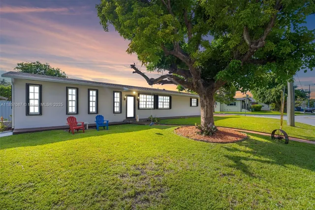a view of a house with a swimming pool