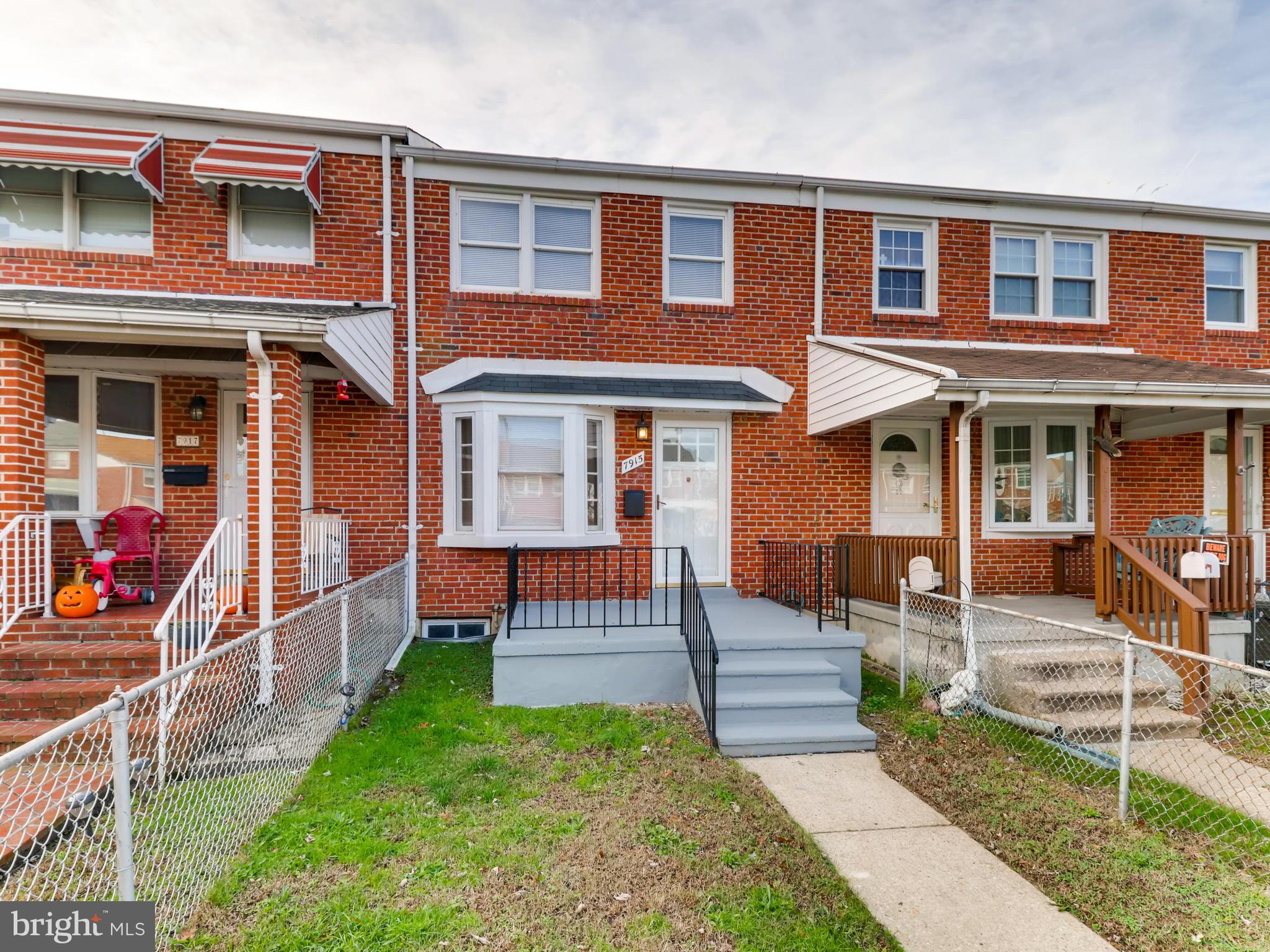 7915 Kavanagh Road Baltimore, MD 21222 - Photo 1 of 12 a front view of a house with a yard