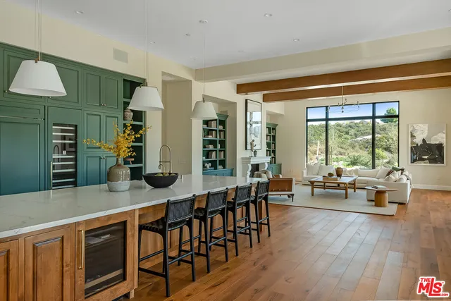 a outdoor living space with furniture and a floor to ceiling window