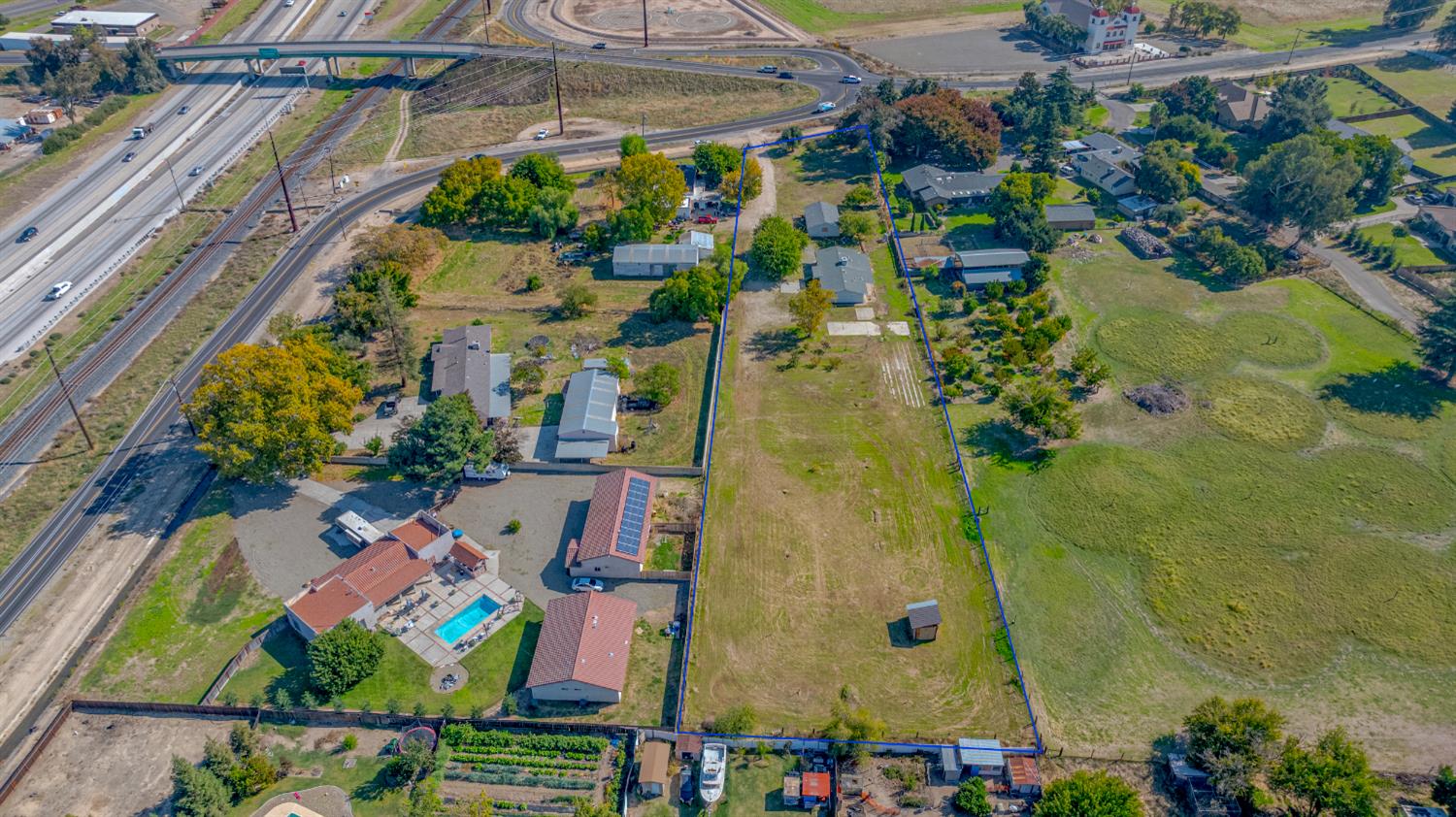 3085 North Buhach Road Atwater, CA 95301 - Photo 12 of 40 an aerial view of residential house with outdoor space and swimming pool