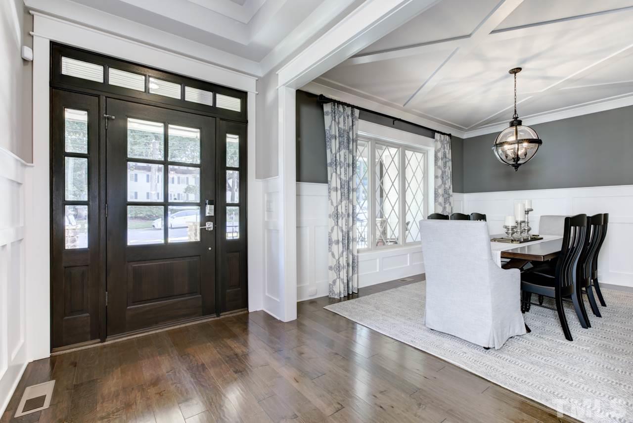 1003 Collins Drive Raleigh, NC 27609 - Photo 2 of 25 The foyer greets you with hardwood floors that carry throughout the main living areas of the home.