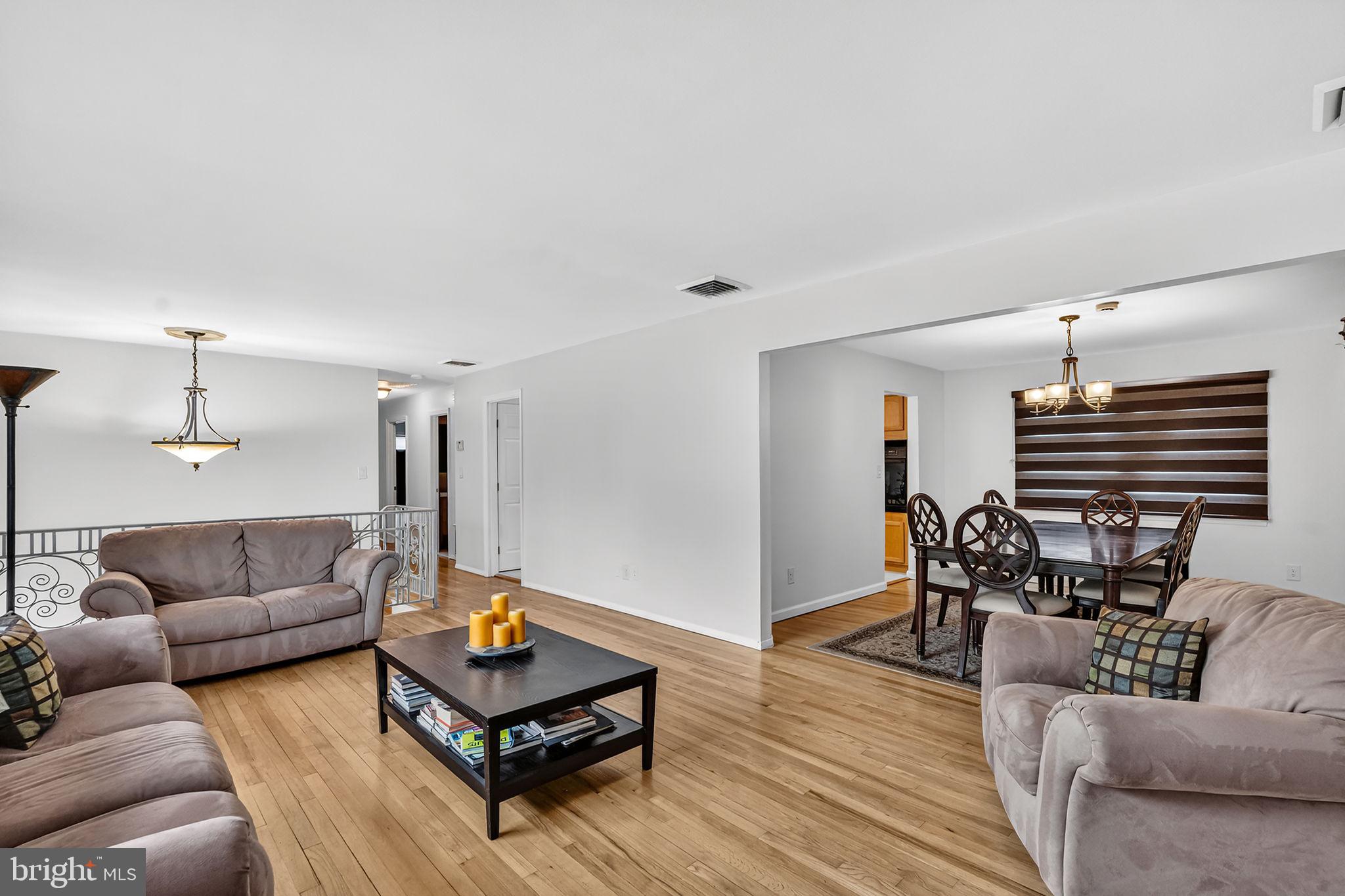 1305 Carlisle Road North Brunswick, NJ 08902 - Photo 11 of 32 Spacious living area with warm ambiance.