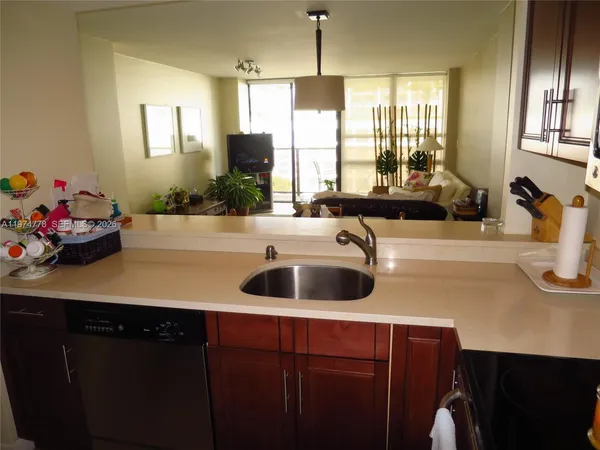 a kitchen with a sink and a cabinets