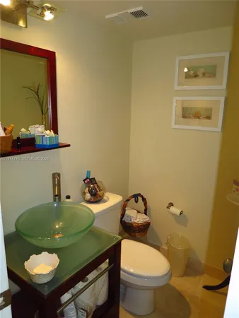 a bathroom with a sink and a toilet