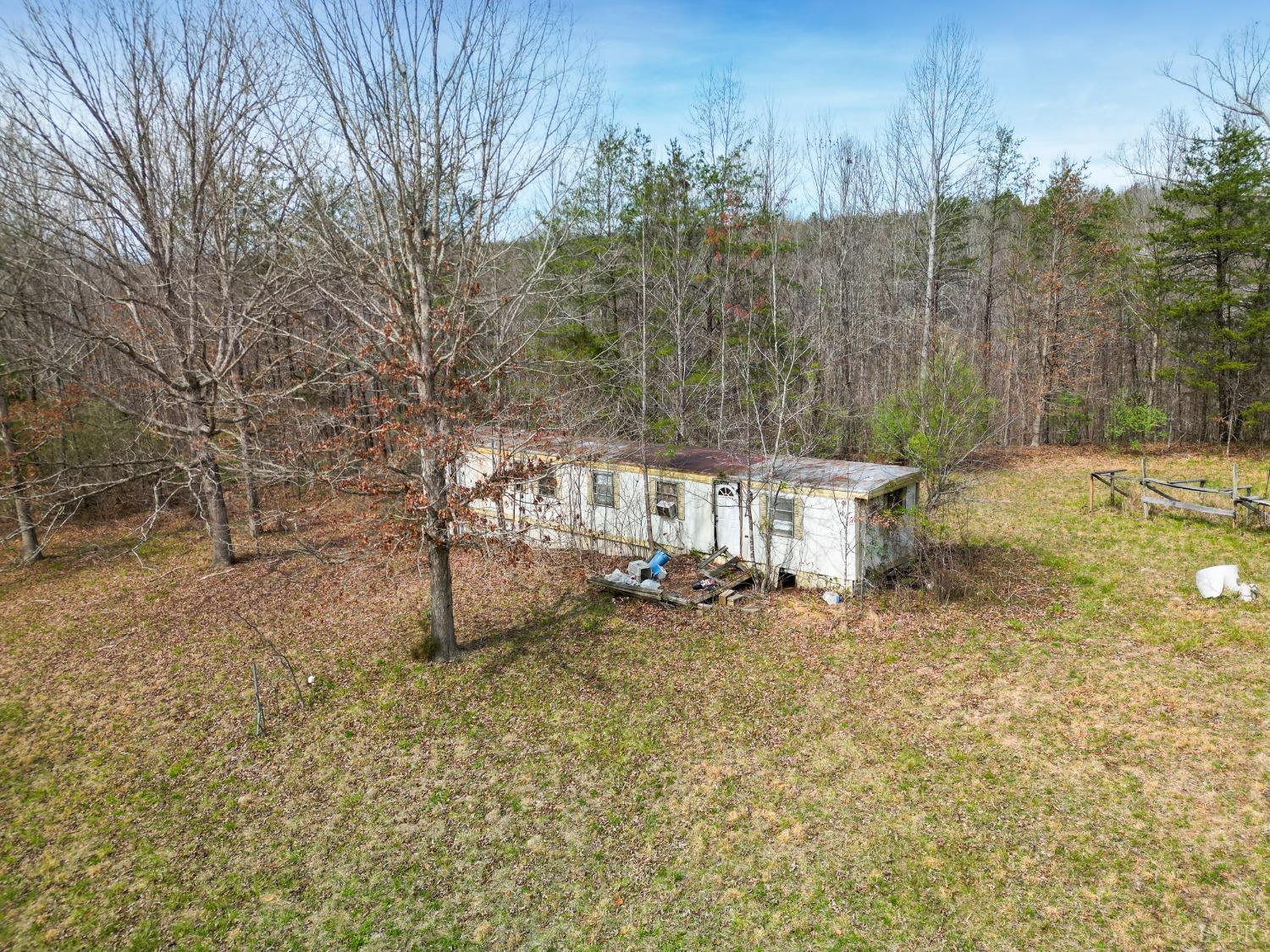949 Toytown Road Amherst, VA 24521 - Photo 15 of 38 a view of a yard with trees in front of it