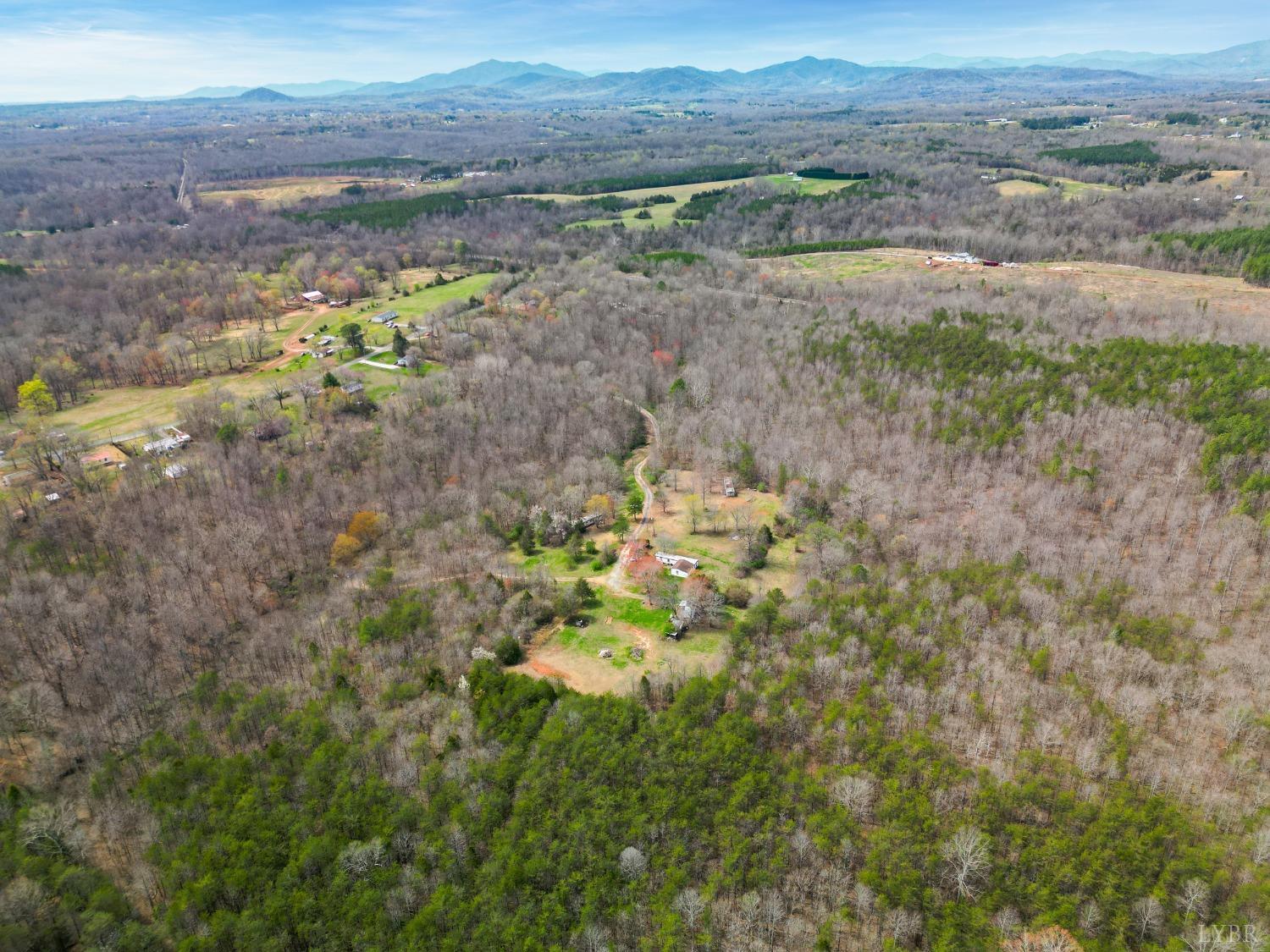 949 Toytown Road Amherst, VA 24521 - Photo 3 of 38 a view of lake with mountain