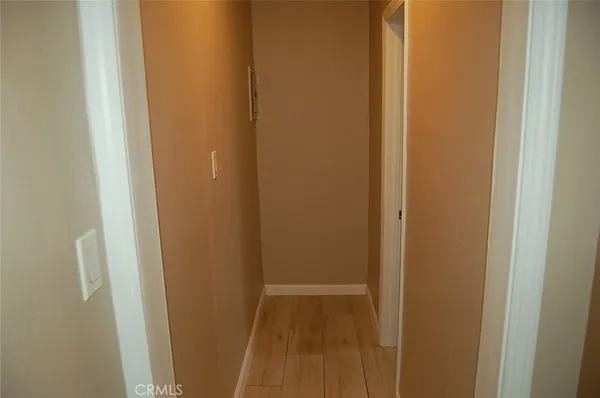 a bathroom with a sink a window and a shower