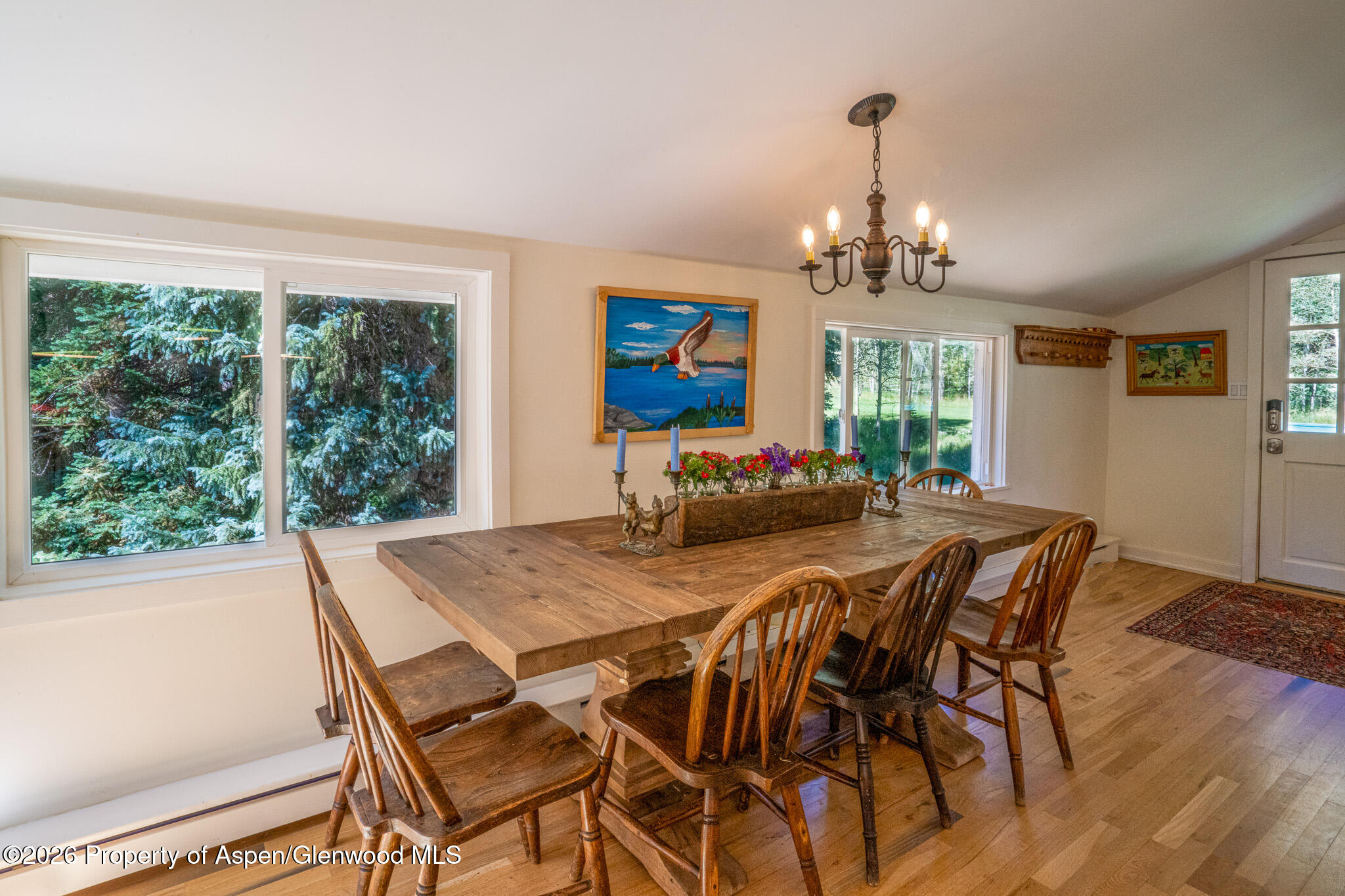 285 Conundrum Creek Road Aspen, CO 81611 - Photo 17 of 35 a view of a dining room with furniture window and outside view