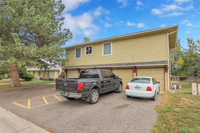 a car parked in front of a house