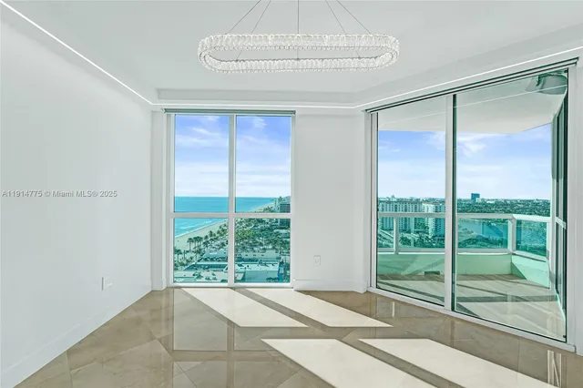 a view of room with window and hardwood floor
