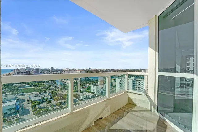 a view of a city skyline from a balcony