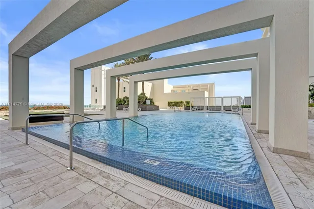 a view of a living room and kitchen view