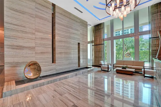 a row of palm trees and swimming pool on a beach