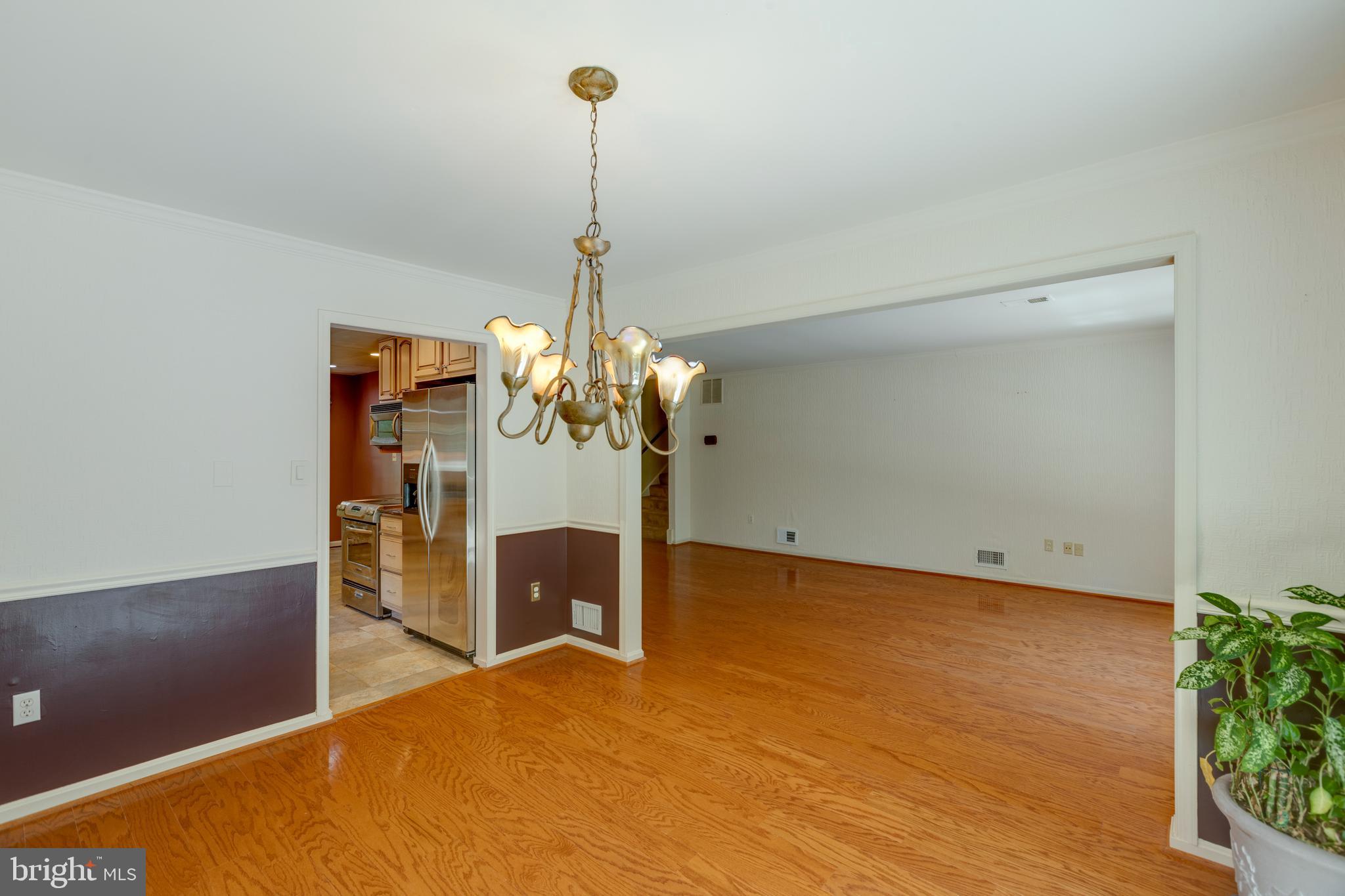 11821 Riders Lane Reston, VA 20191 - Photo 13 of 44 a view of a chandelier in a room