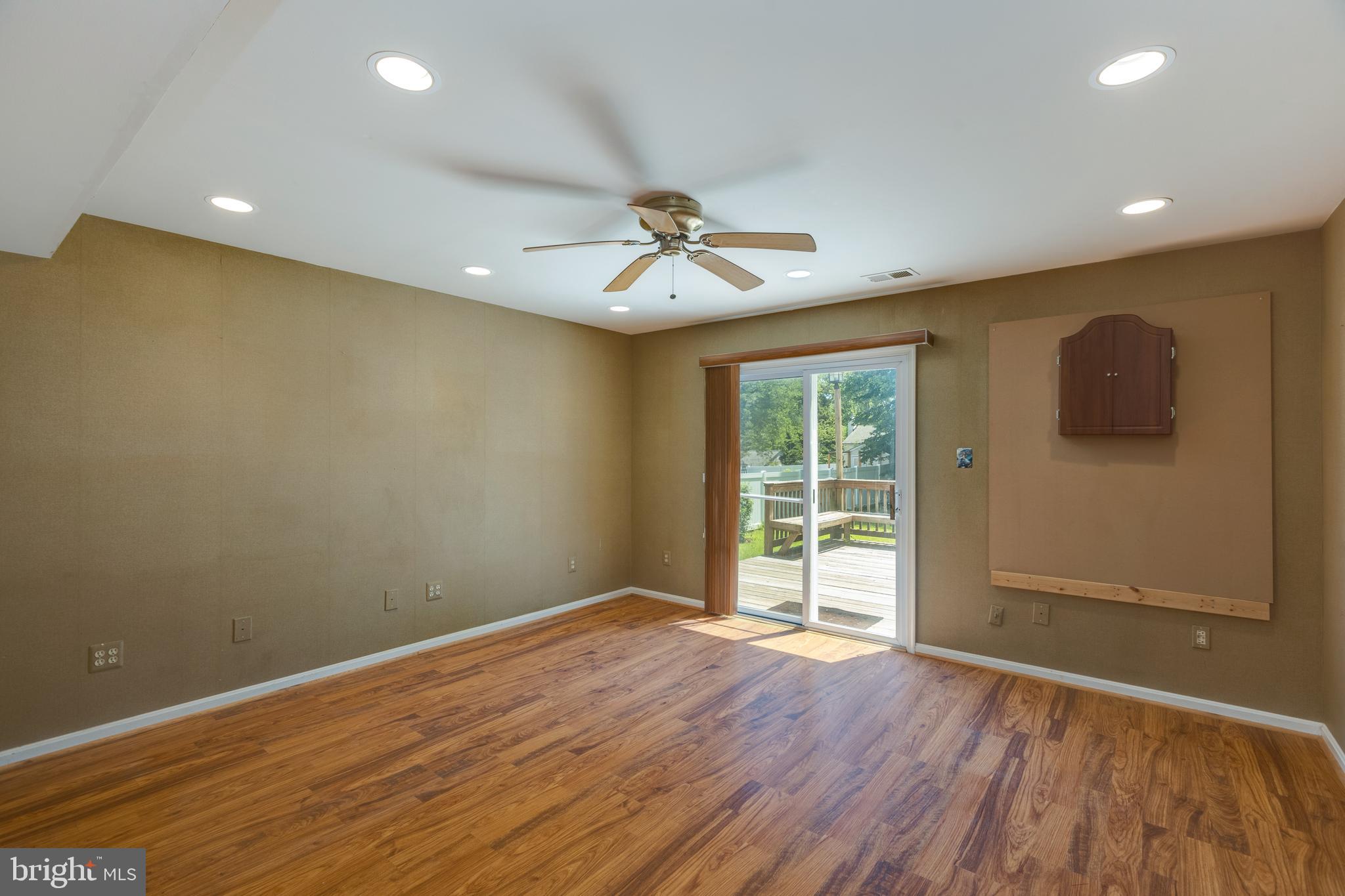 11821 Riders Lane Reston, VA 20191 - Photo 22 of 44 wooden floor in an empty room with a window