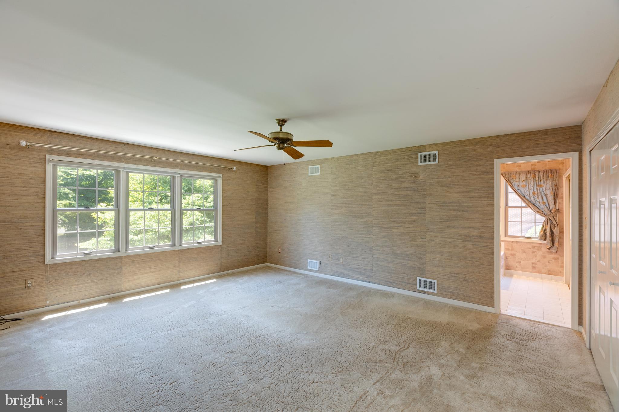 11821 Riders Lane Reston, VA 20191 - Photo 25 of 44 a view of an empty room with a window