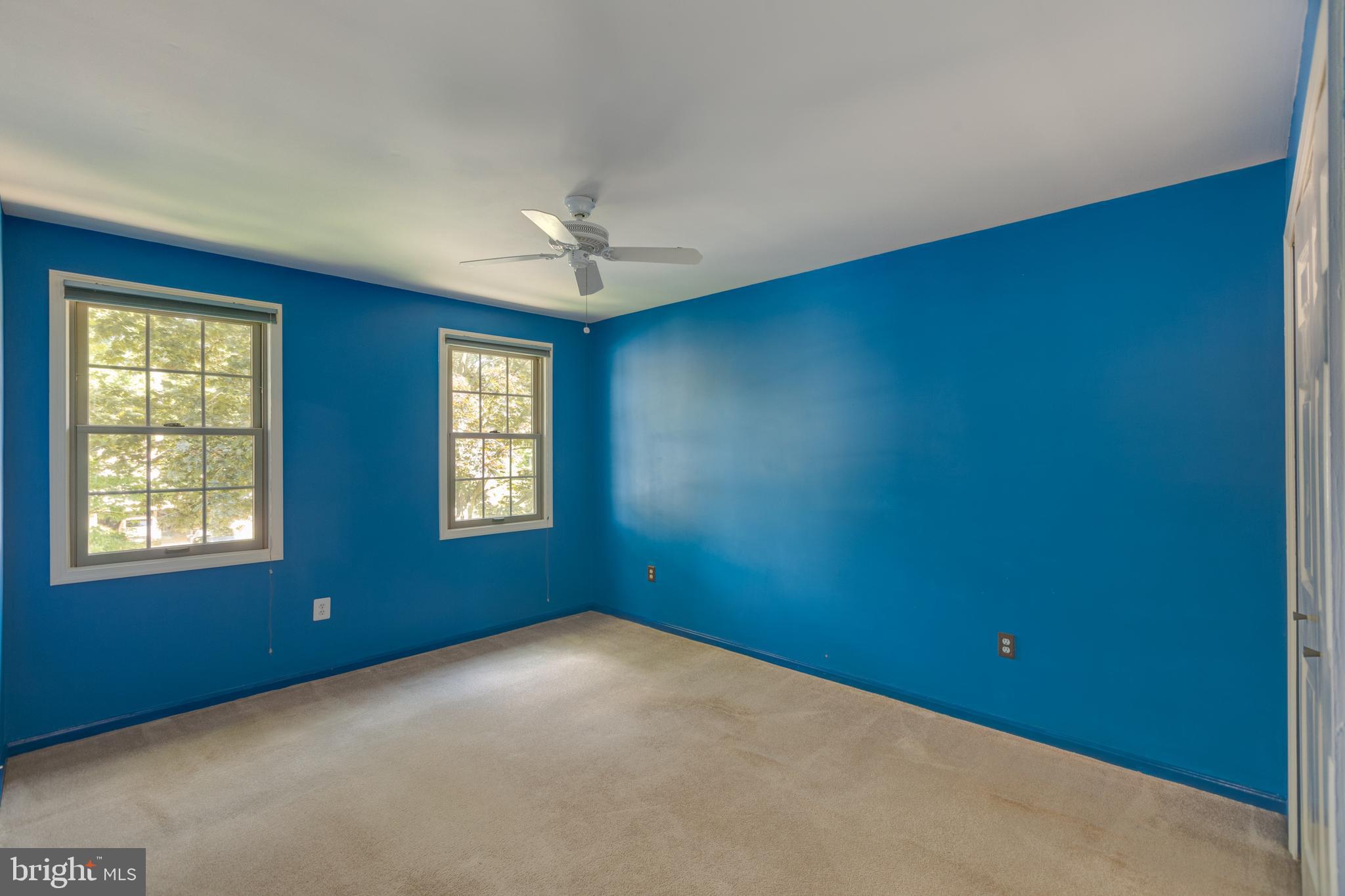 11821 Riders Lane Reston, VA 20191 - Photo 31 of 44 a view of an empty room with windows