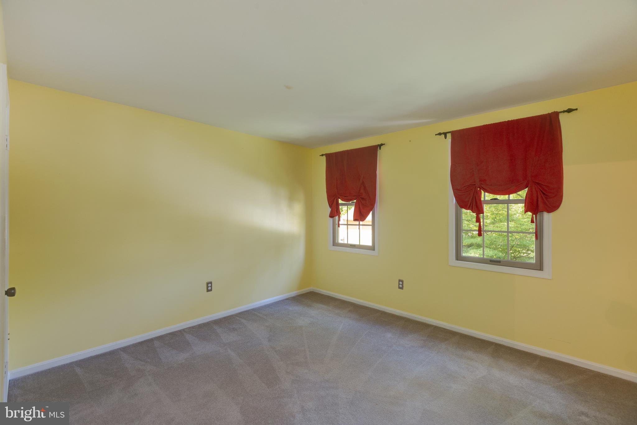 11821 Riders Lane Reston, VA 20191 - Photo 32 of 44 an empty room with windows