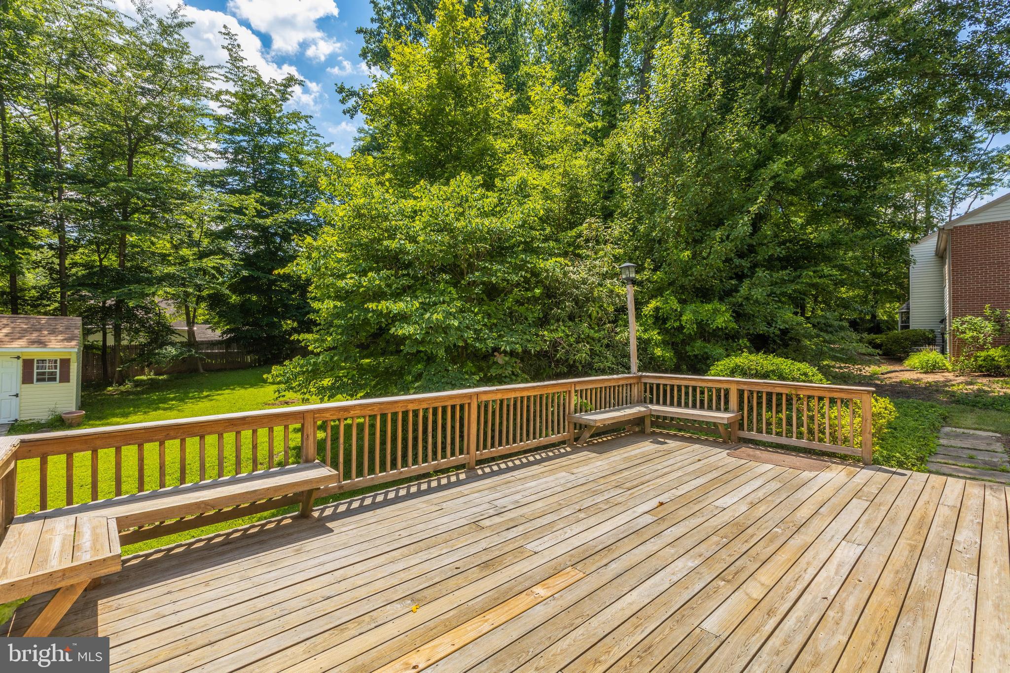 11821 Riders Lane Reston, VA 20191 - Photo 33 of 44 a view of balcony with deck and wooden floor