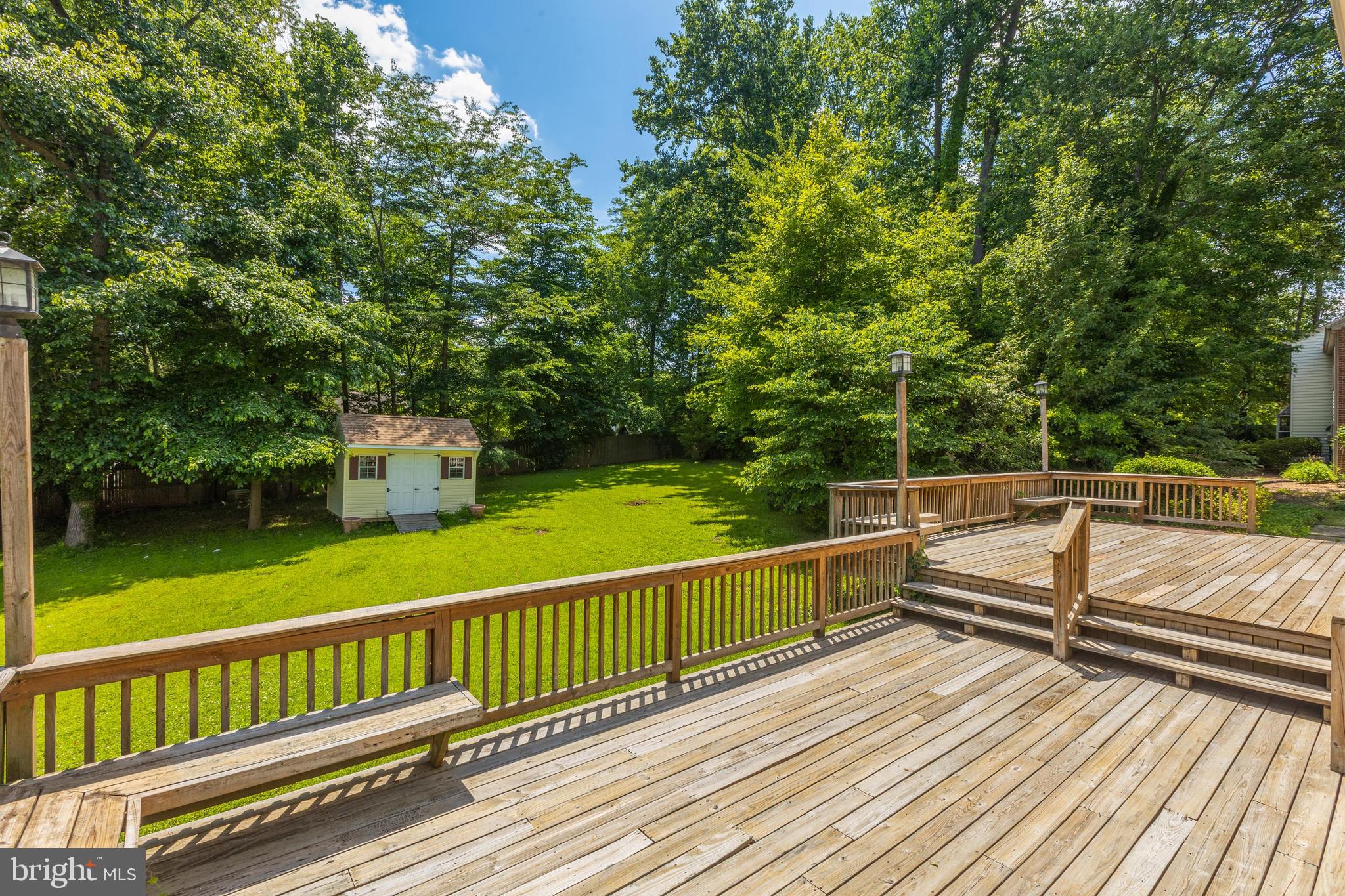 11821 Riders Lane Reston, VA 20191 - Photo 35 of 44 a view of balcony with wooden floor and fence
