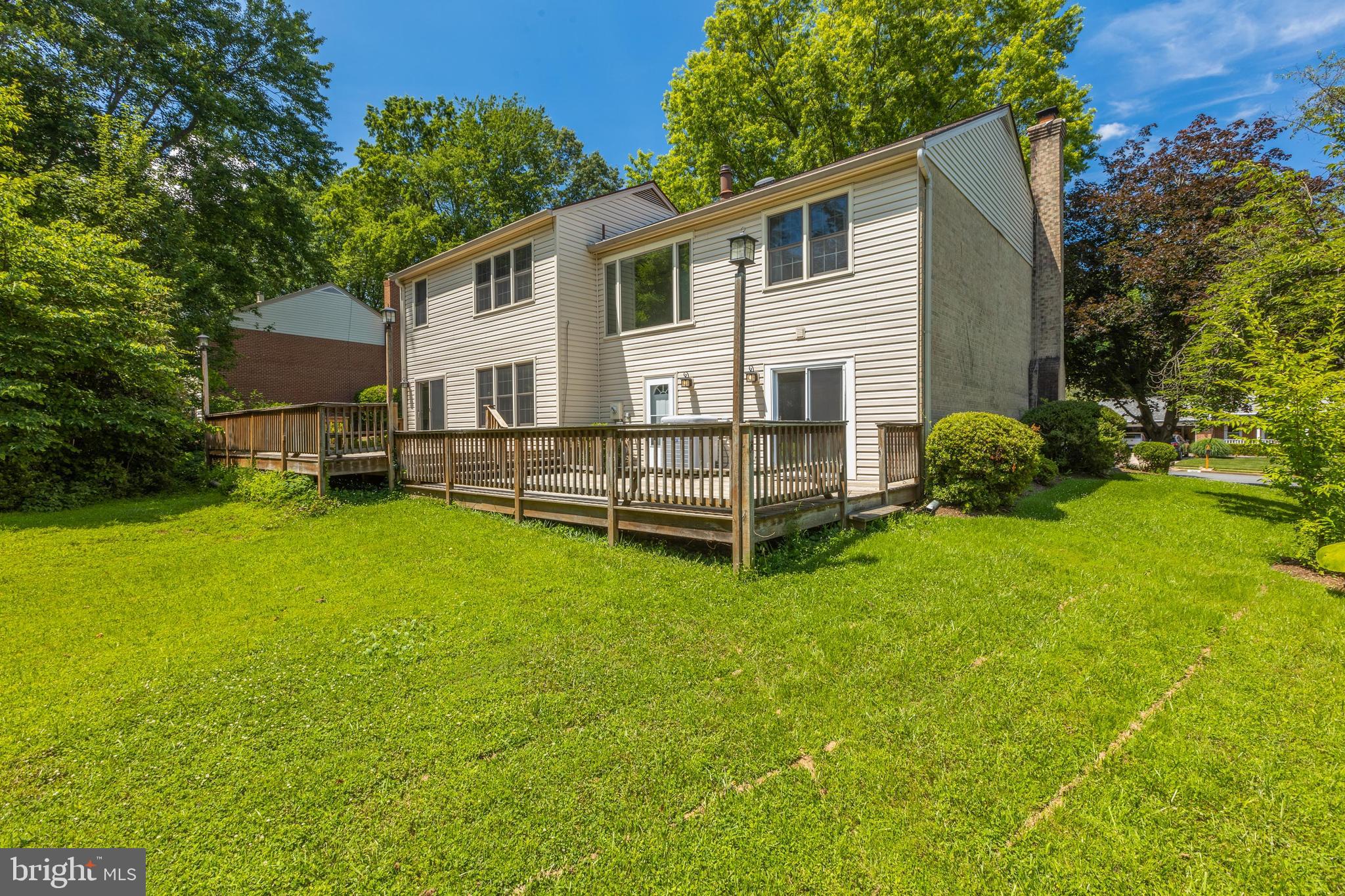 11821 Riders Lane Reston, VA 20191 - Photo 38 of 44 a view of a house with a backyard