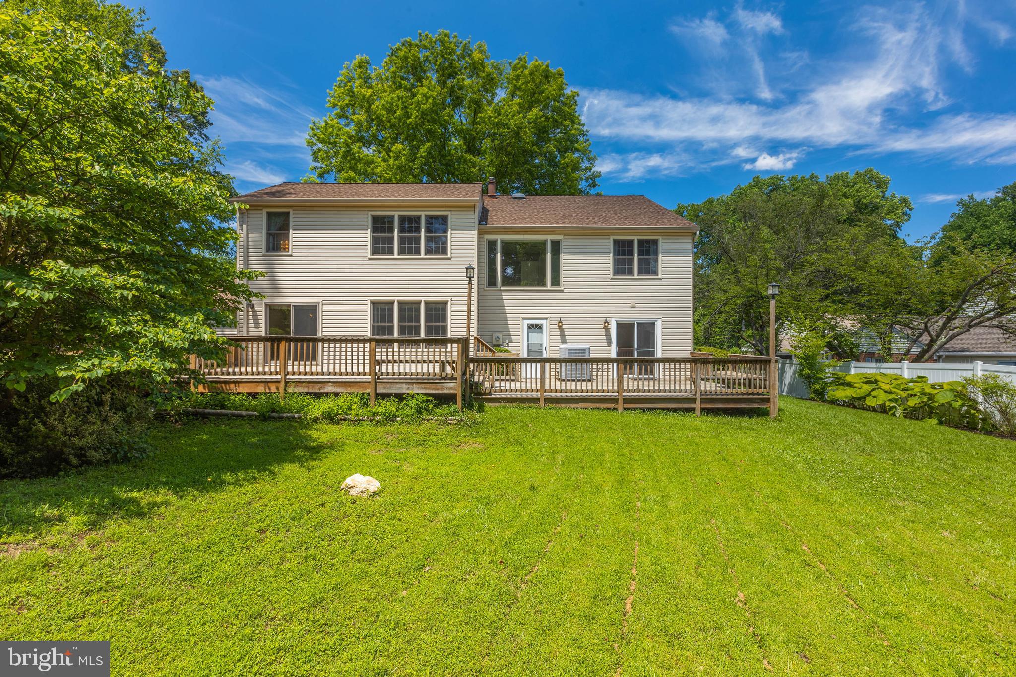 11821 Riders Lane Reston, VA 20191 - Photo 39 of 44 a view of a house with a yard porch and sitting area