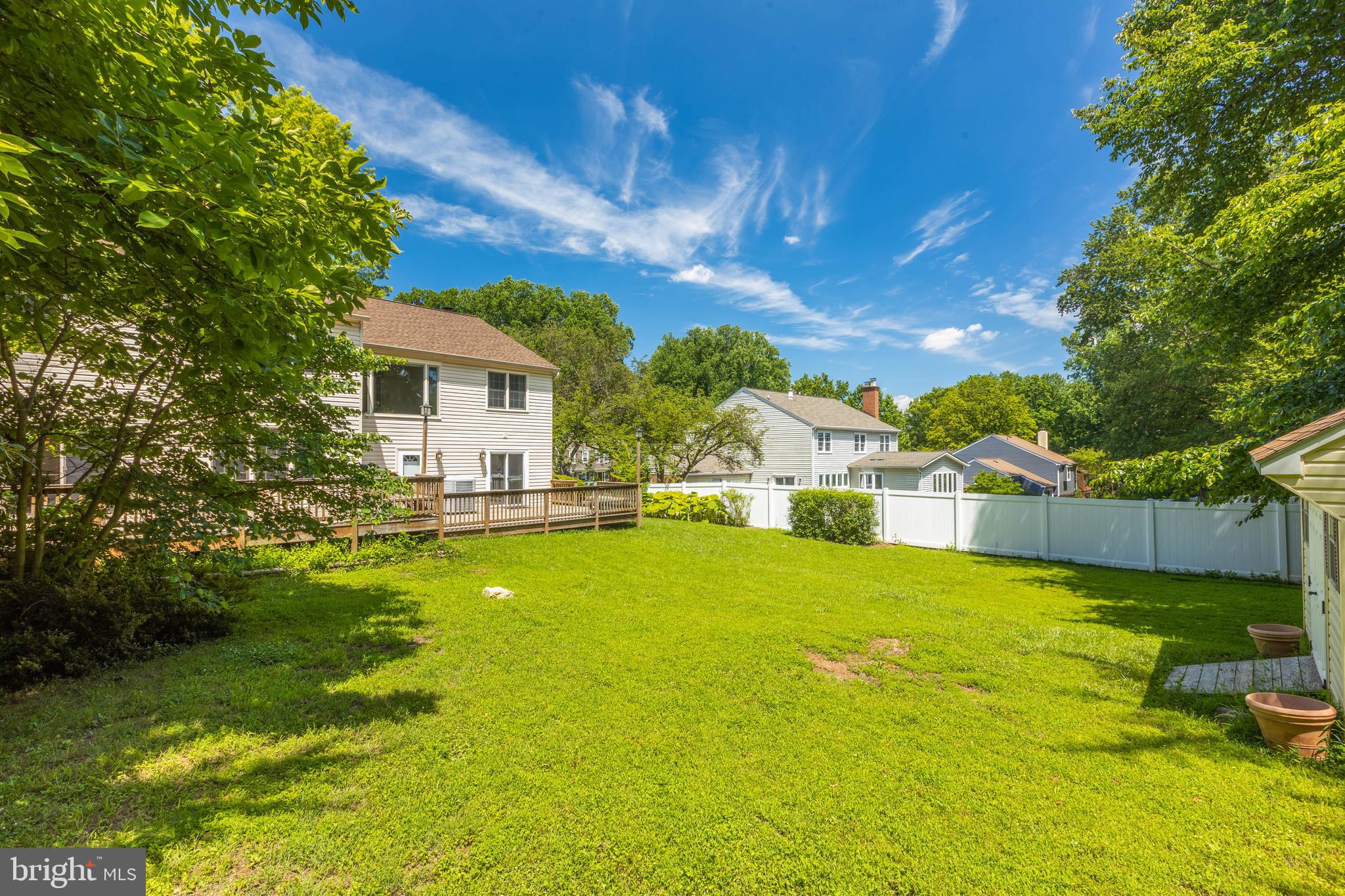 11821 Riders Lane Reston, VA 20191 - Photo 40 of 44 a front view of house with yard and swimming pool