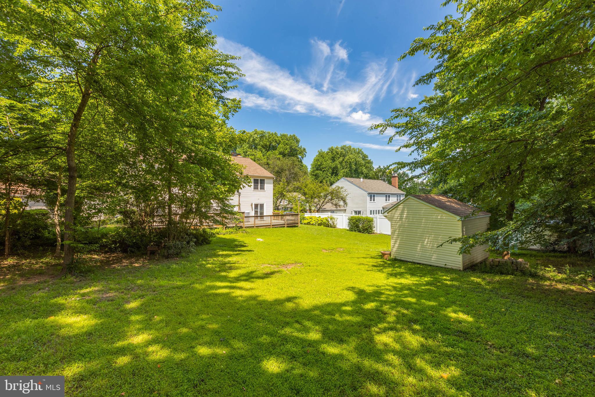 11821 Riders Lane Reston, VA 20191 - Photo 41 of 44 a view of a swimming pool with an outdoor space and seating area