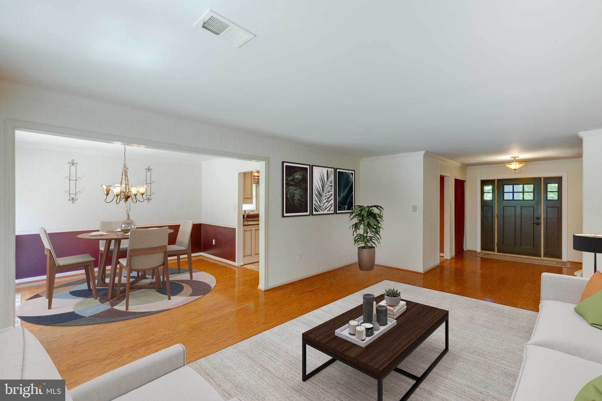 11821 Riders Lane Reston, VA 20191 - Photo 10 of 44 a living room with furniture and wooden floor