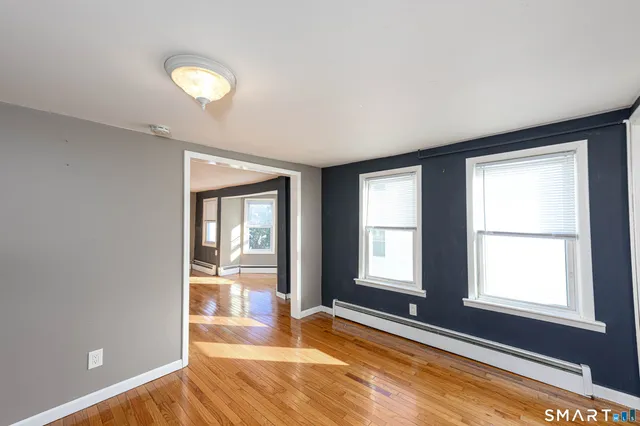 a view of an empty room and window