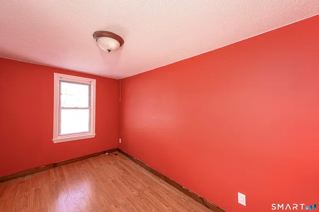 a view of a room with a window