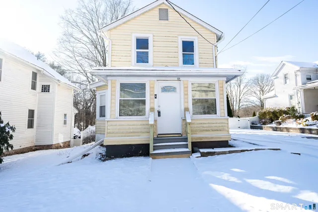 a view of a house with a patio