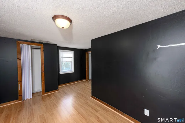 a view of livingroom with hardwood floor and window