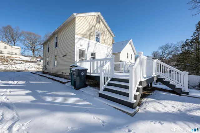 a view of a house with a porch