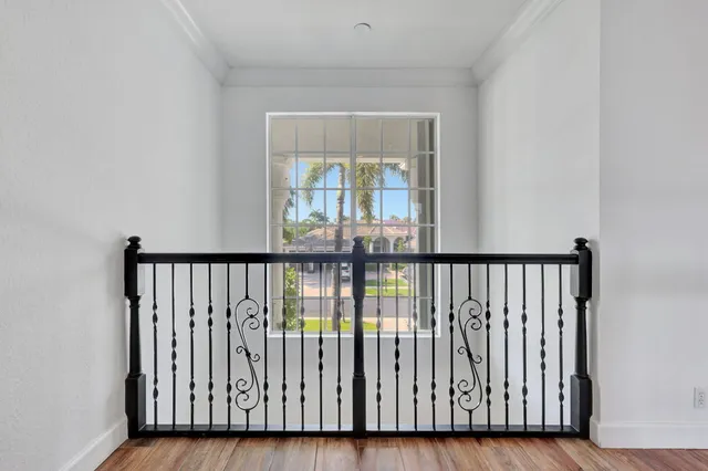 a bathroom with a toilet a sink and a mirror