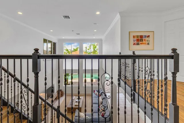a bathroom with a granite countertop toilet sink and a mirror