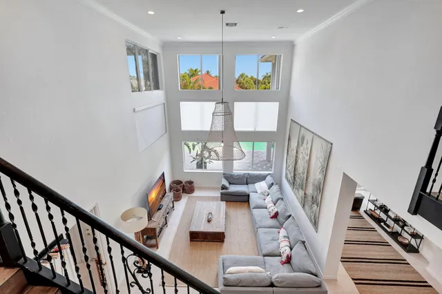 a bedroom with two beds and a window