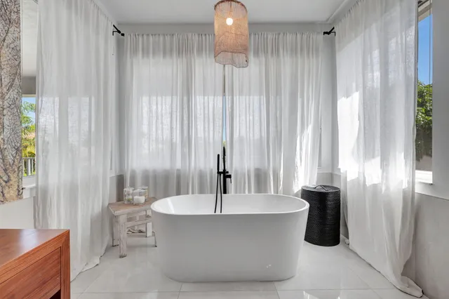 a view of a swimming pool and a yard