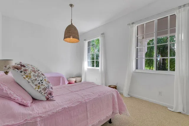an aerial view of a swimming pool and outdoor space