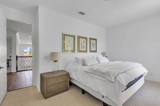 a house with a yard and a palm tree