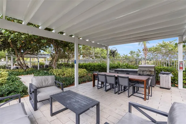 a outdoor living space with furniture and garden view