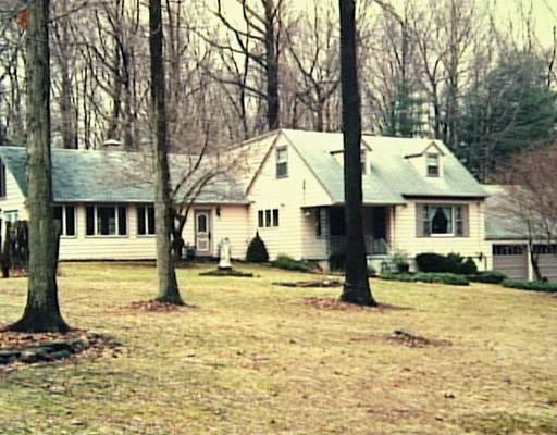 27 Old Green Road Trumbull, CT 06611 - Photo 1 of 1 a front view of a house with a yard